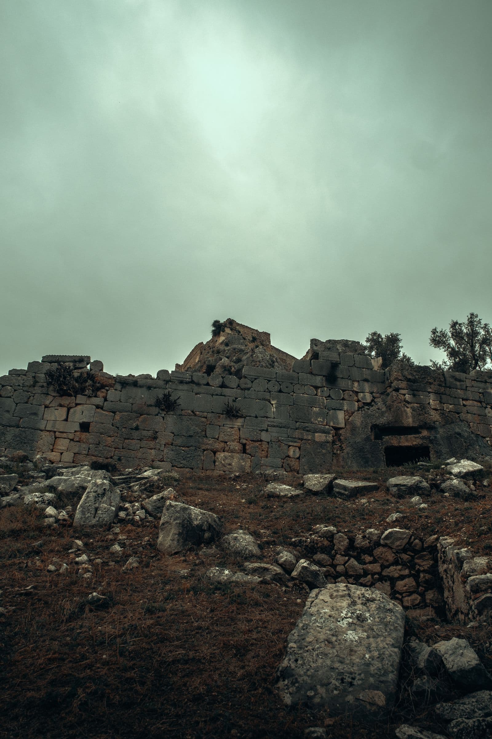 Weathered stone walls on a hillside